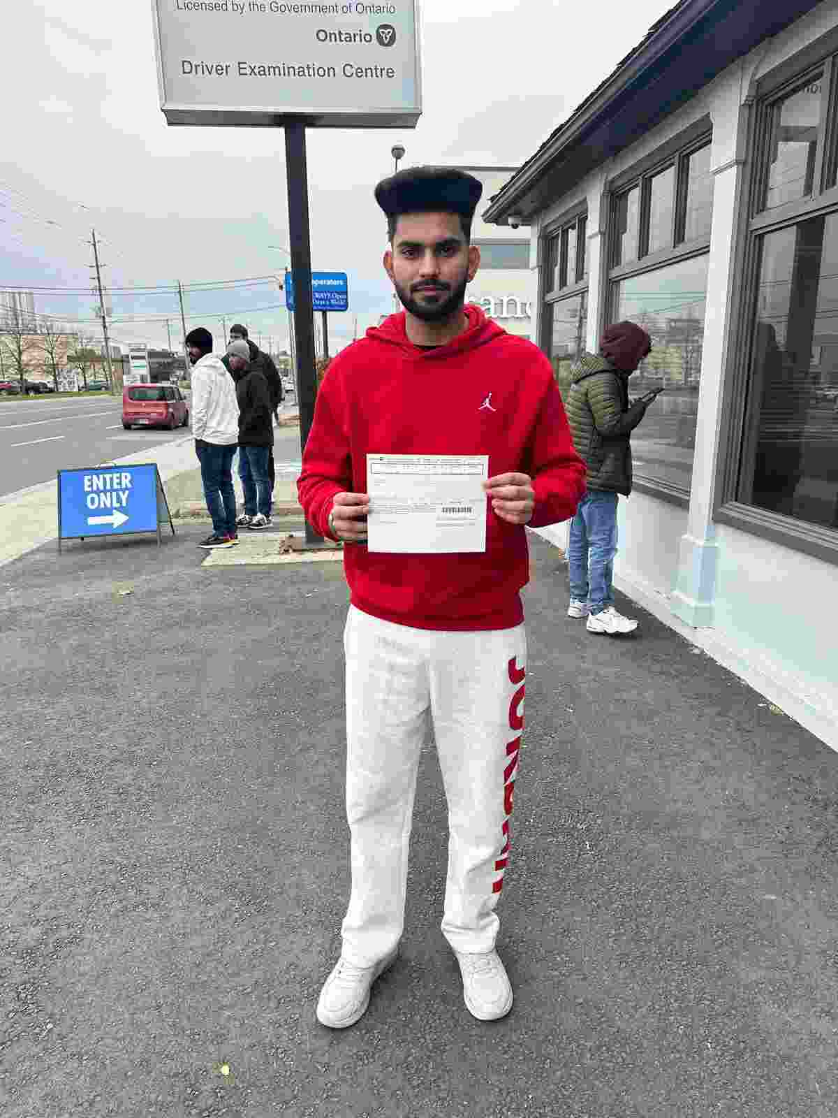 Student Showing a Drive Vision Approved Driving Certificate